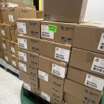 Boxes stacked on a pallet wrapper 